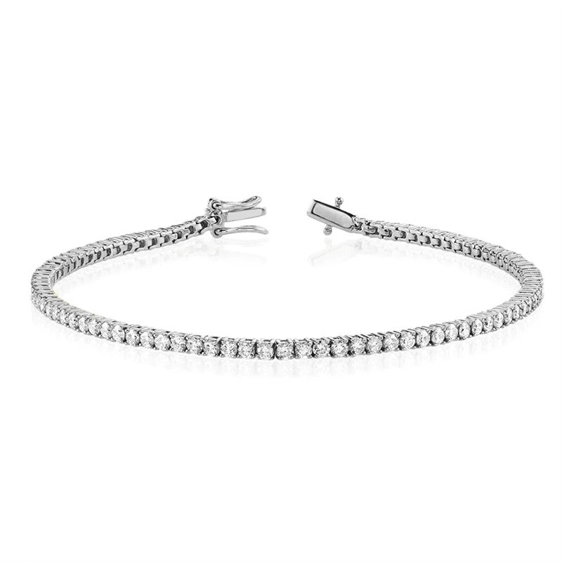 Tine armbånd i sterlingsølv med klare zirkonia fra MerlePerle – tennisarmbånd med sommerfuglelås.